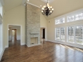 Living room with two story fireplace Living room with two story fireplace