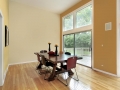 Eating area with two story windows Eating area with two story windows